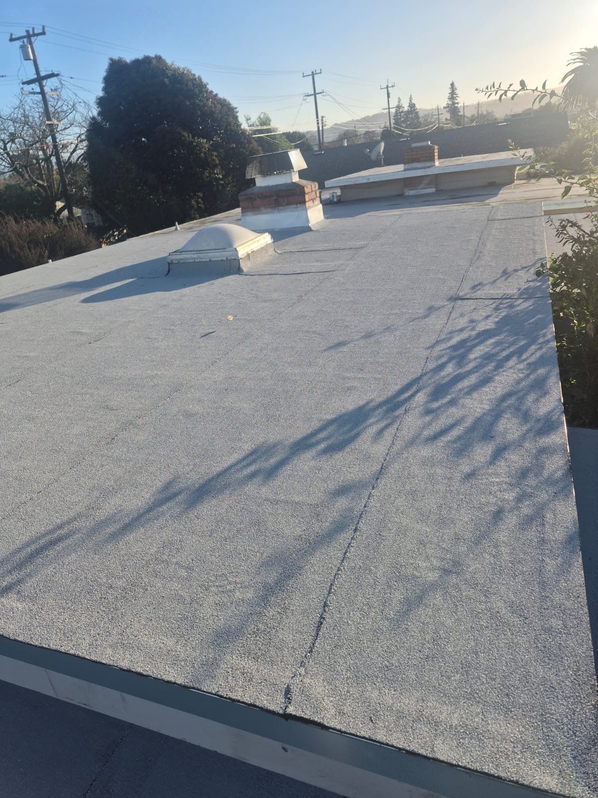 White GTA 3-Layer Modified Bitumen Flat Roof Installation